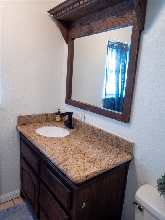 372 East Fm 771 Riviera, TX 78379 - Photo 28 of 40 a bathroom with a granite countertop sink and a mirror