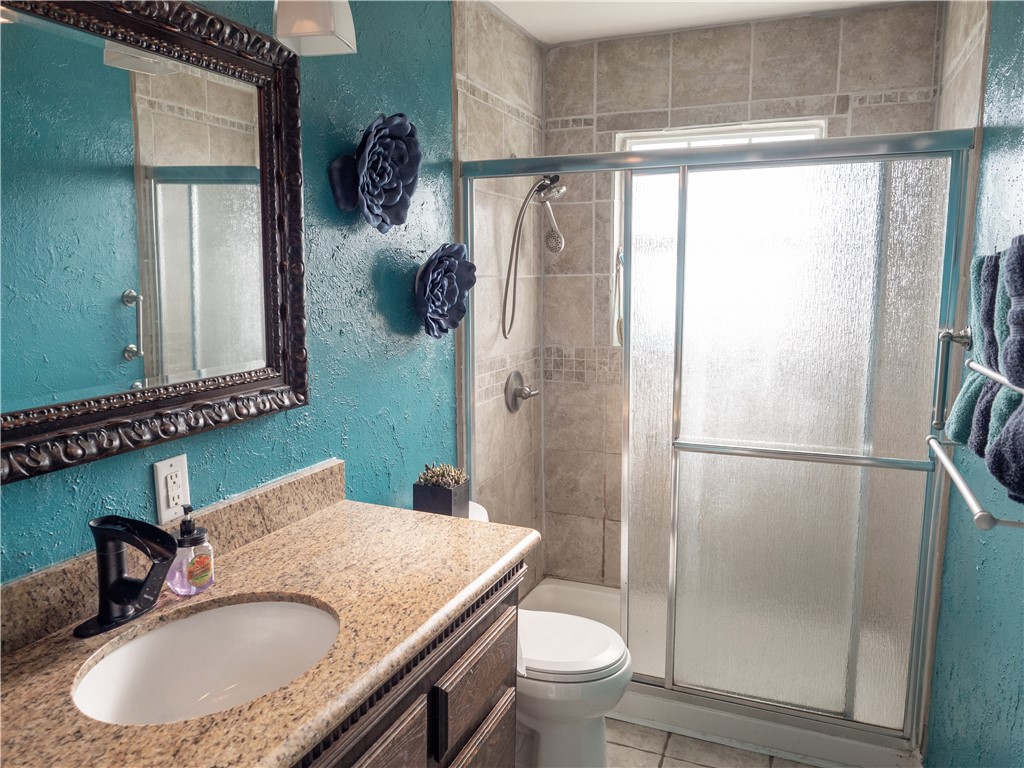 372 East Fm 771 Riviera, TX 78379 - Photo 30 of 40 a bathroom with a sink toilet and shower