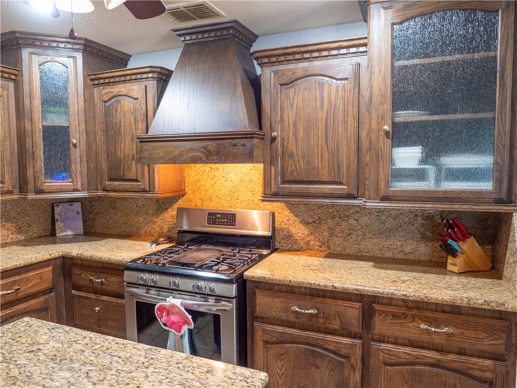 372 East Fm 771 Riviera, TX 78379 - Photo 7 of 40 a kitchen with a stove and a refrigerator