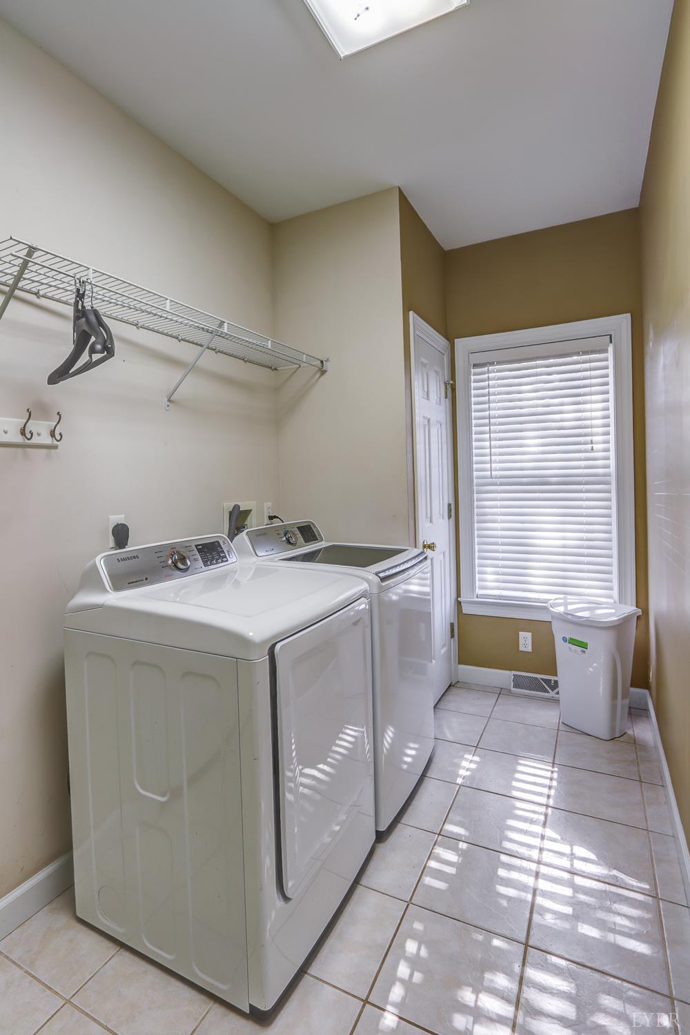 1315 Donnally Road Forest, VA 24551 - Photo 24 of 74 a utility room with cabinets