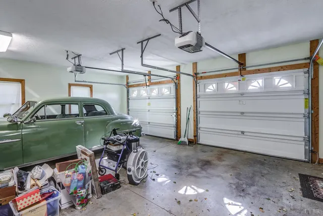 a bathroom with a toilet a sink and shower