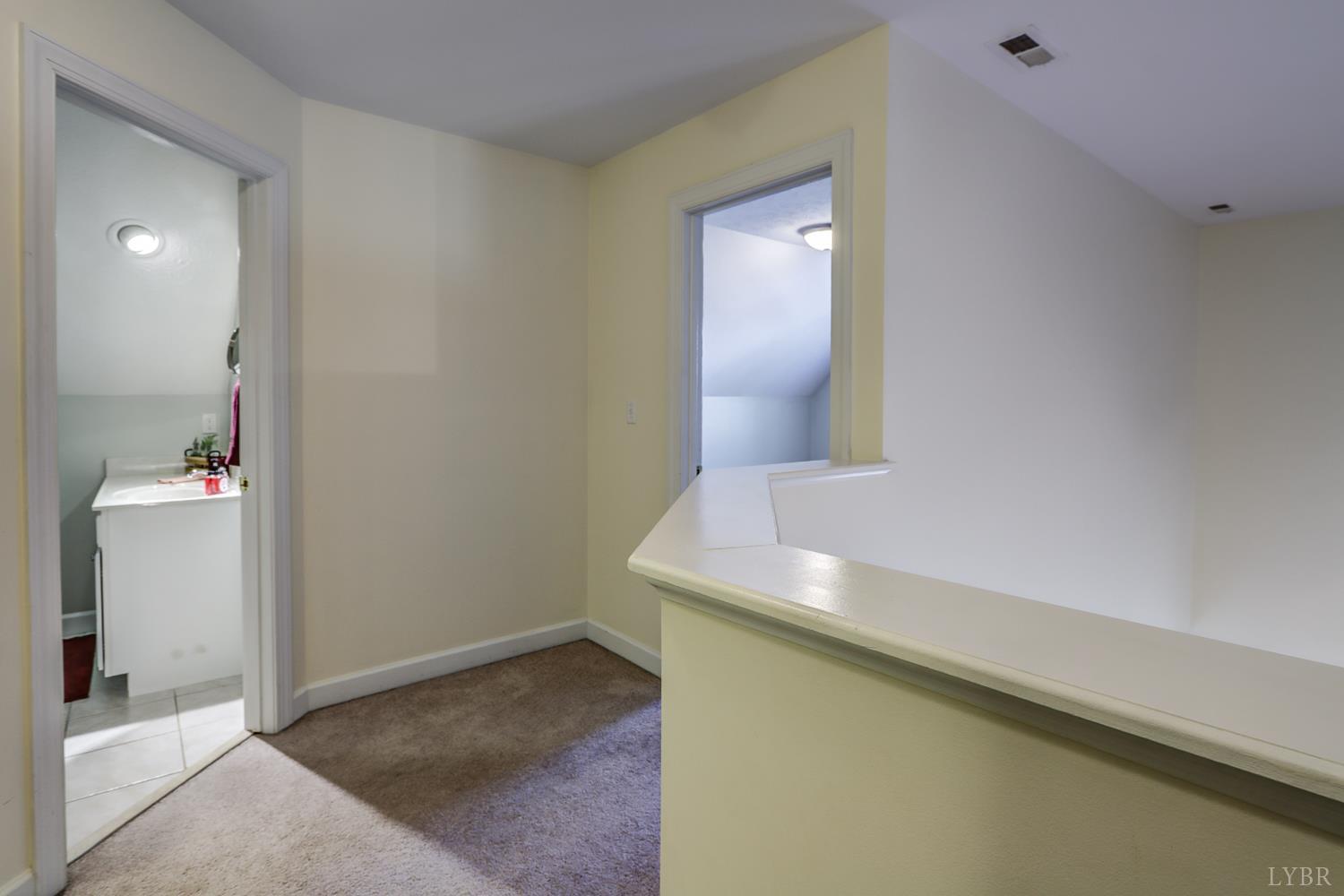 1315 Donnally Road Forest, VA 24551 - Photo 40 of 74 a bathroom with a sink and a mirror