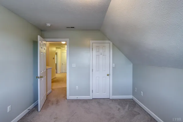 a bathroom with a granite countertop sink