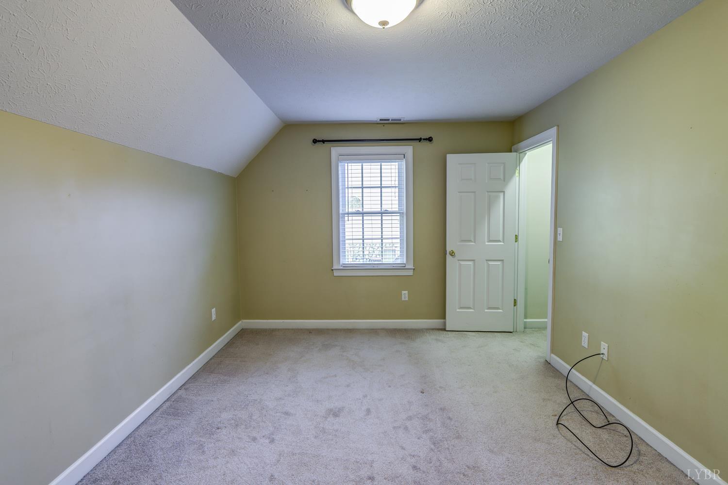 1315 Donnally Road Forest, VA 24551 - Photo 51 of 74 an empty room with windows