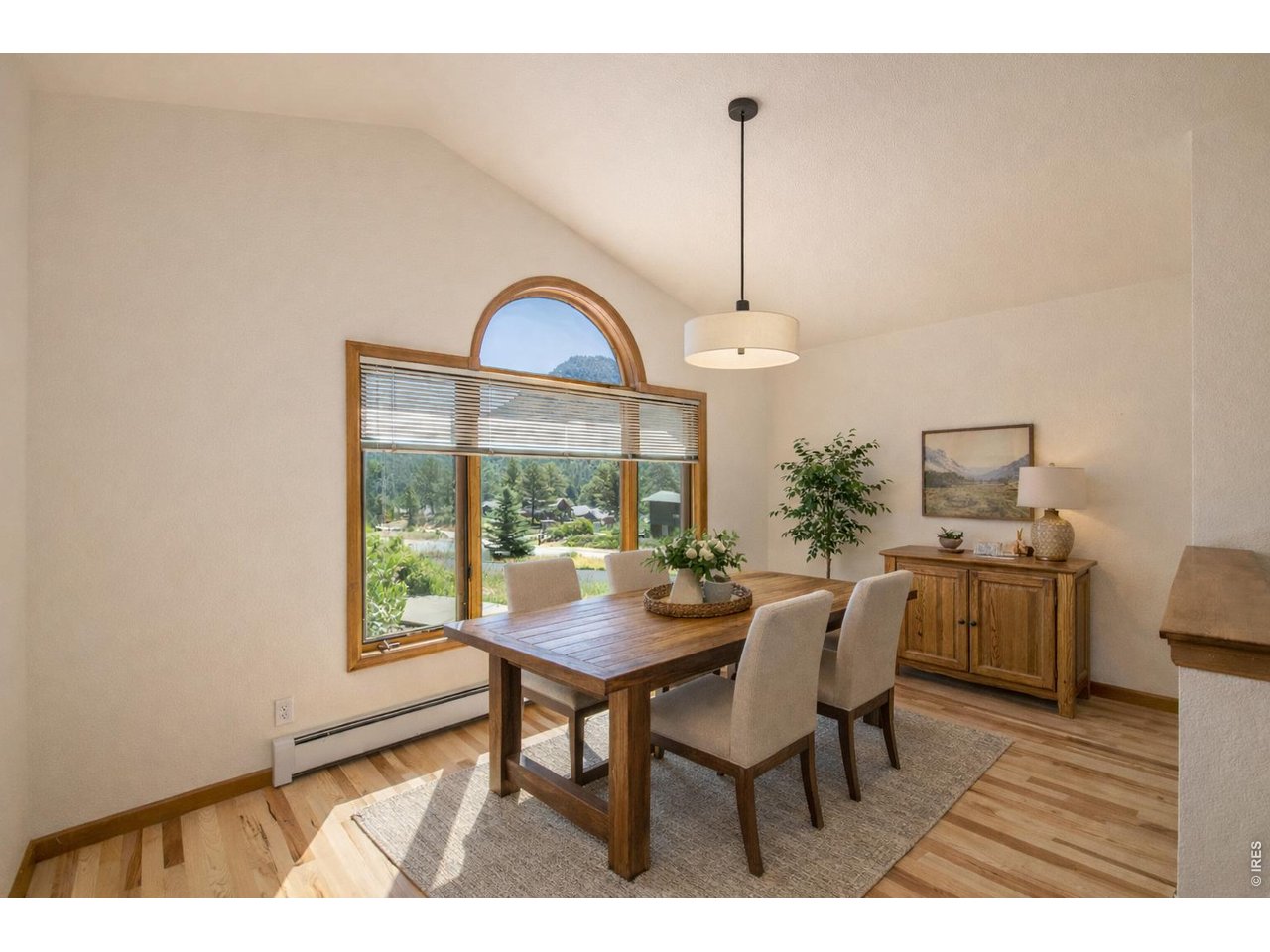 683 Cedar Ridge Circle Estes Park, CO 80517 - Photo 11 of 39 a view of a dining room with furniture window and outside view