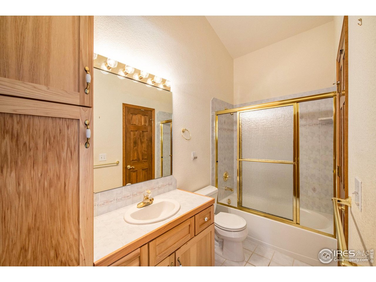 683 Cedar Ridge Circle Estes Park, CO 80517 - Photo 24 of 39 a bathroom with a sink and a mirror