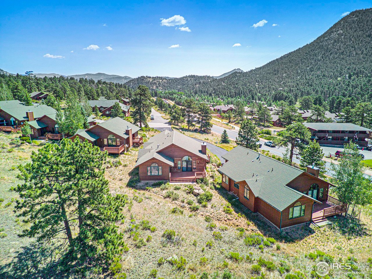 683 Cedar Ridge Circle Estes Park, CO 80517 - Photo 28 of 39 an aerial view of a house with a garden
