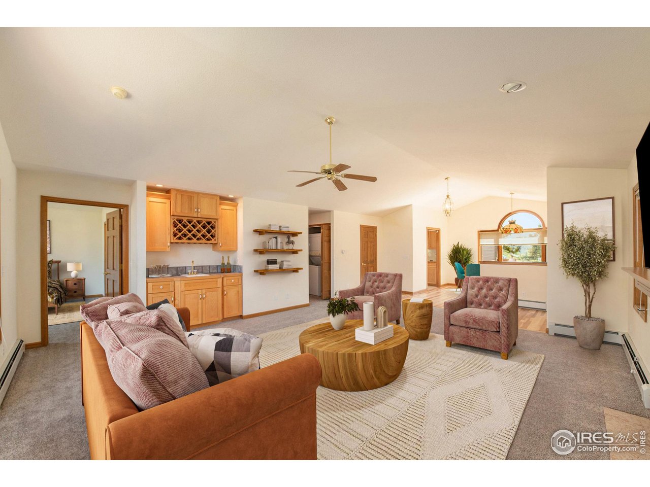 683 Cedar Ridge Circle Estes Park, CO 80517 - Photo 3 of 39 a living room with furniture and a large window