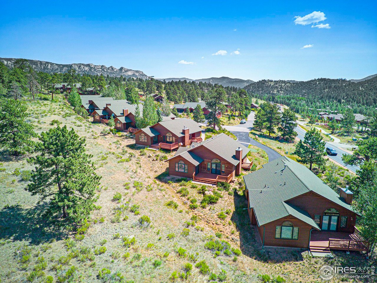 683 Cedar Ridge Circle Estes Park, CO 80517 - Photo 34 of 39 a view of a house with a mountain in the background