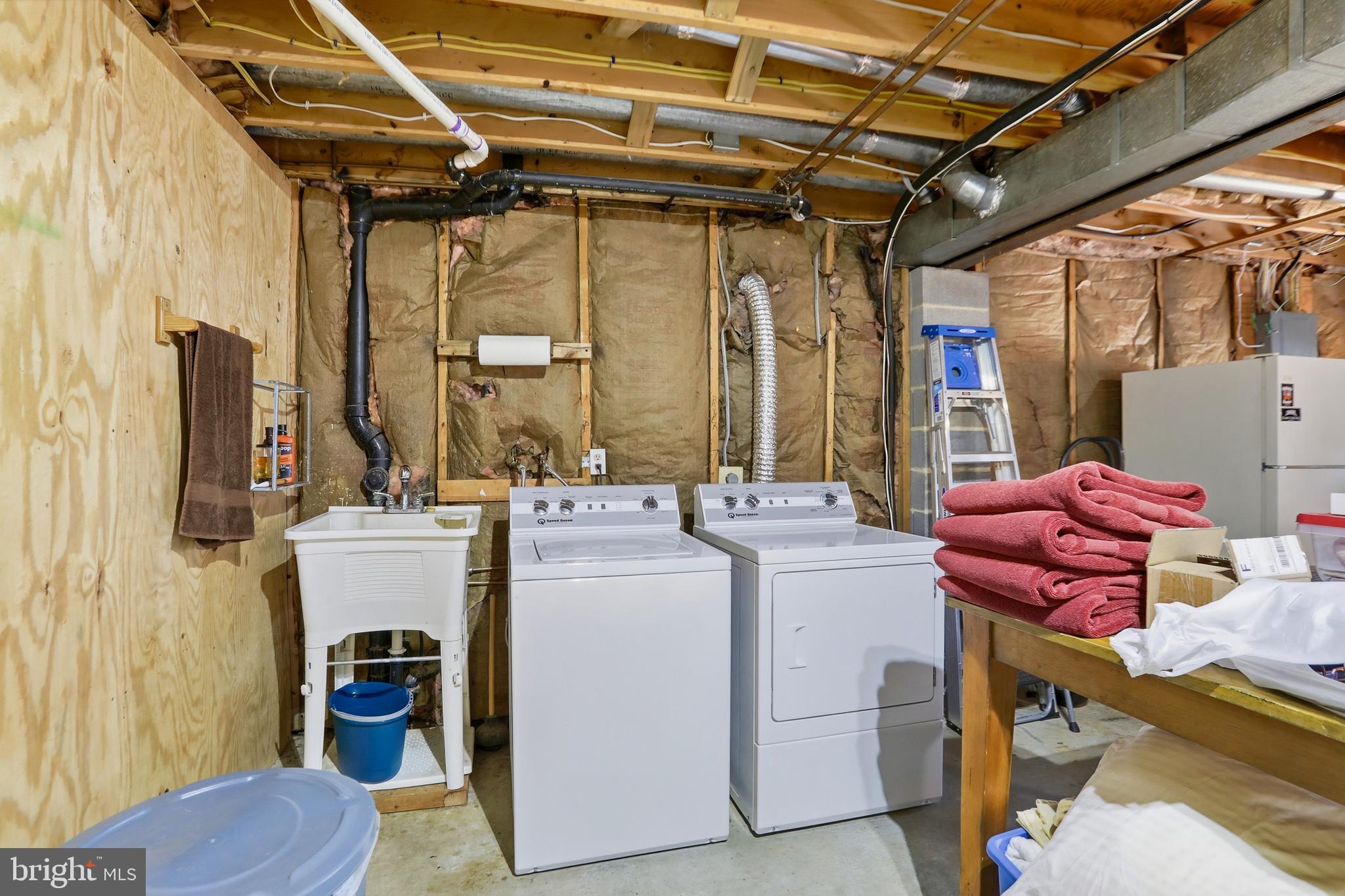 4708 Summit Point Road Charles Town, WV 25414 - Photo 27 of 49 a utility room with dryer and washer