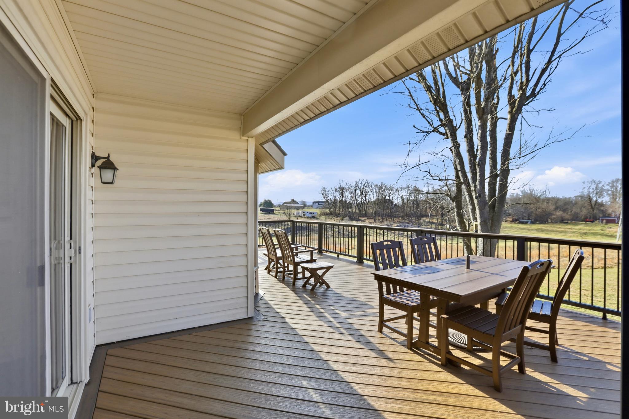 4708 Summit Point Road Charles Town, WV 25414 - Photo 32 of 49 a view of a outdoor seating area with furniture