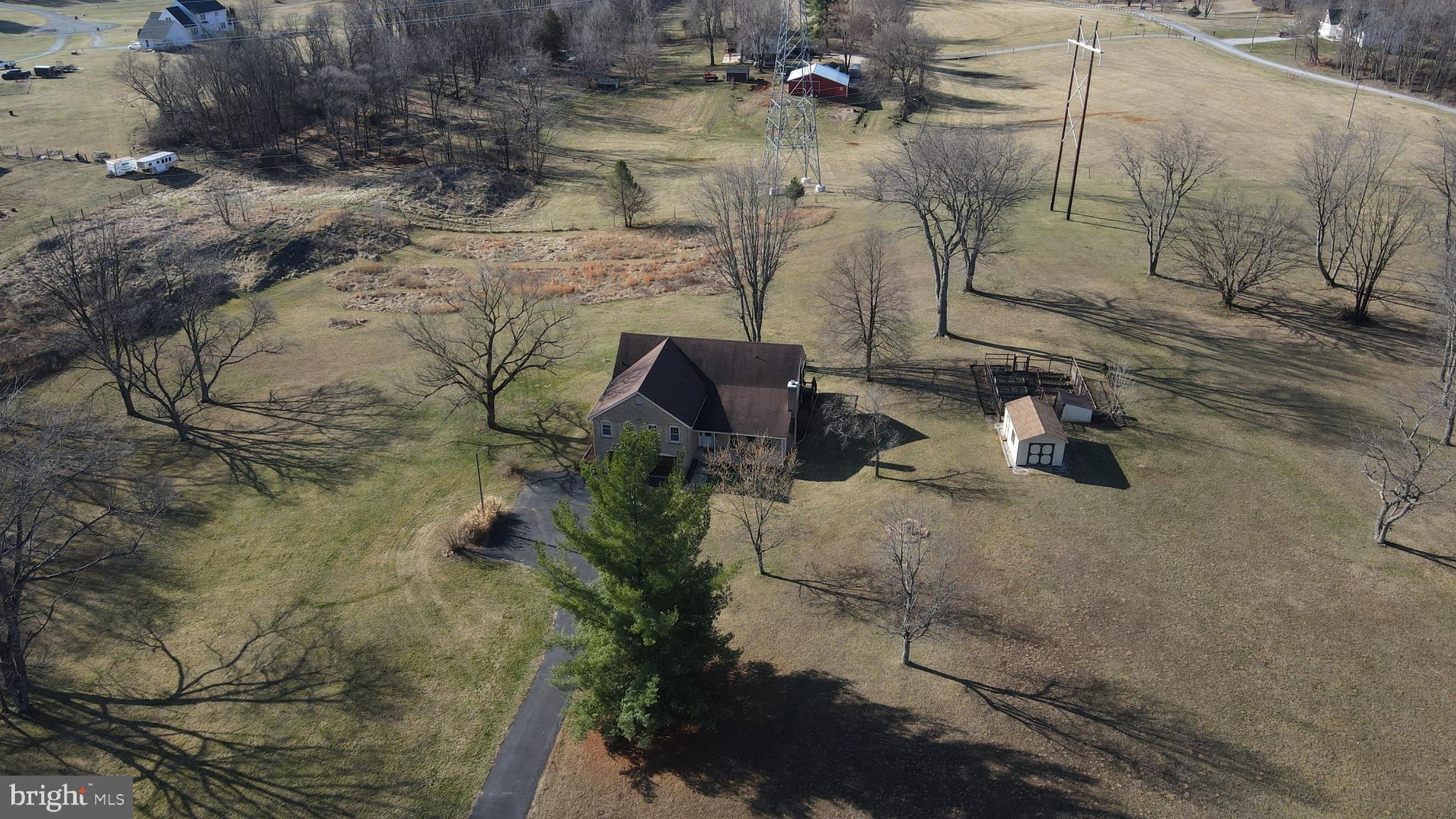 4708 Summit Point Road Charles Town, WV 25414 - Photo 41 of 49 a view of a backyard of a house