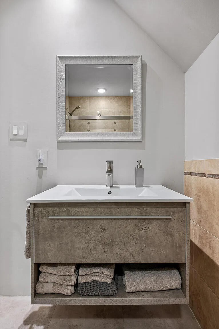467 Wisley Way Ringgold, GA 30736 - Photo 18 of 40 a bathroom with a sink and a mirror