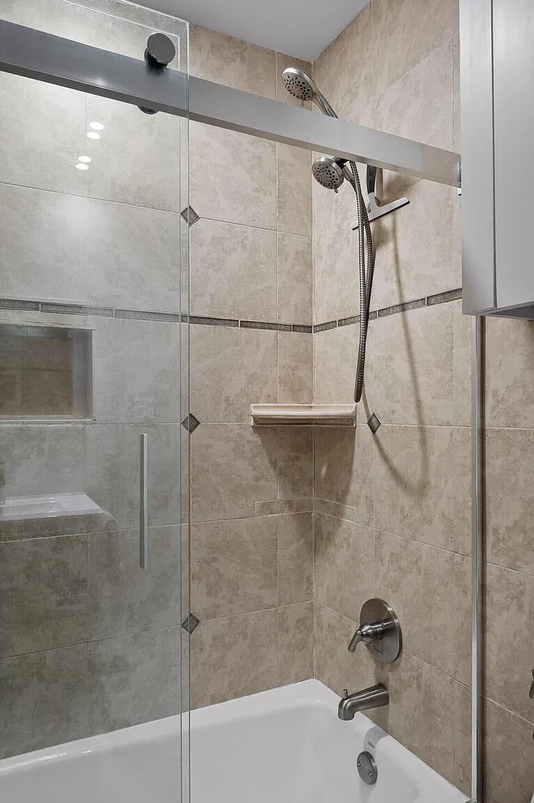 467 Wisley Way Ringgold, GA 30736 - Photo 19 of 40 a bathroom with a shower and a shower head