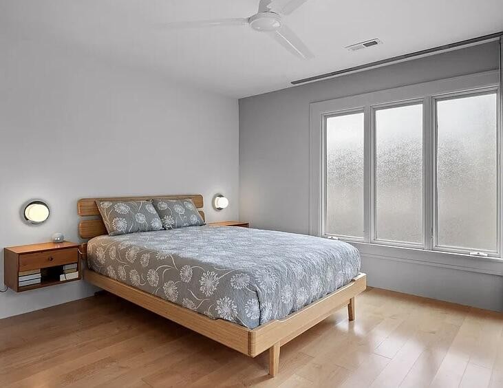 467 Wisley Way Ringgold, GA 30736 - Photo 20 of 40 a bedroom with a bed lamp and window