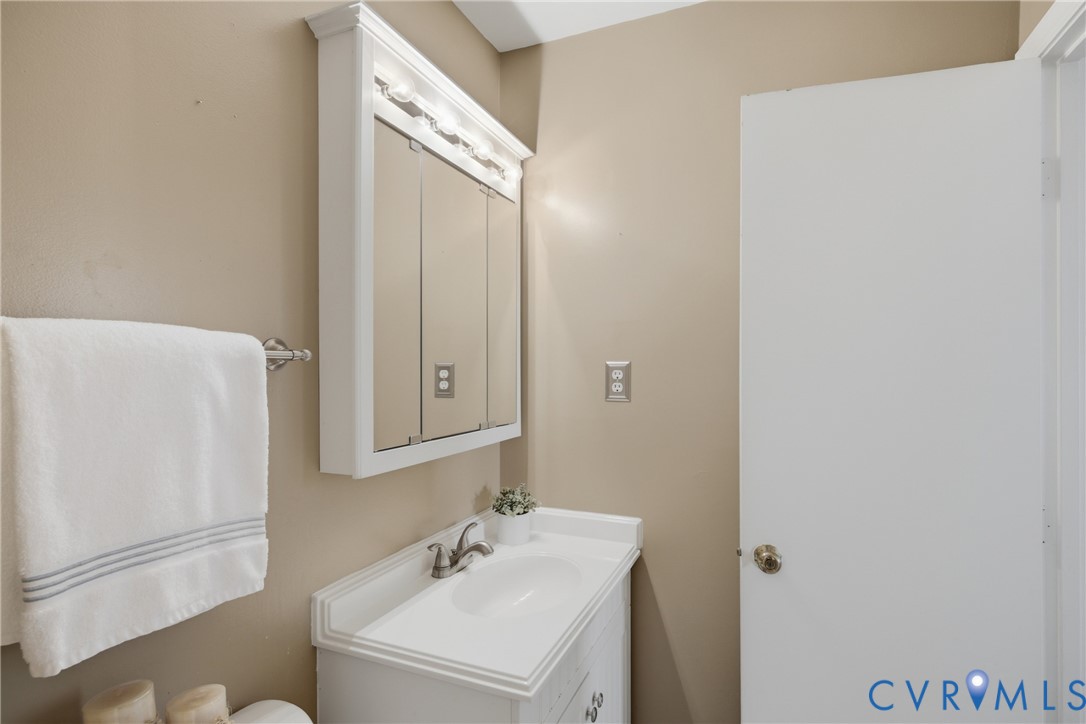 9832 Alfaree Road Richmond, VA 23237 - Photo 18 of 35 Half bath featuring vanity