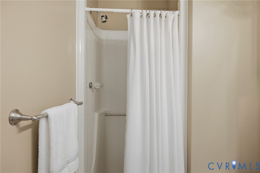 9832 Alfaree Road Richmond, VA 23237 - Photo 19 of 35 Full bathroom featuring a shower stall