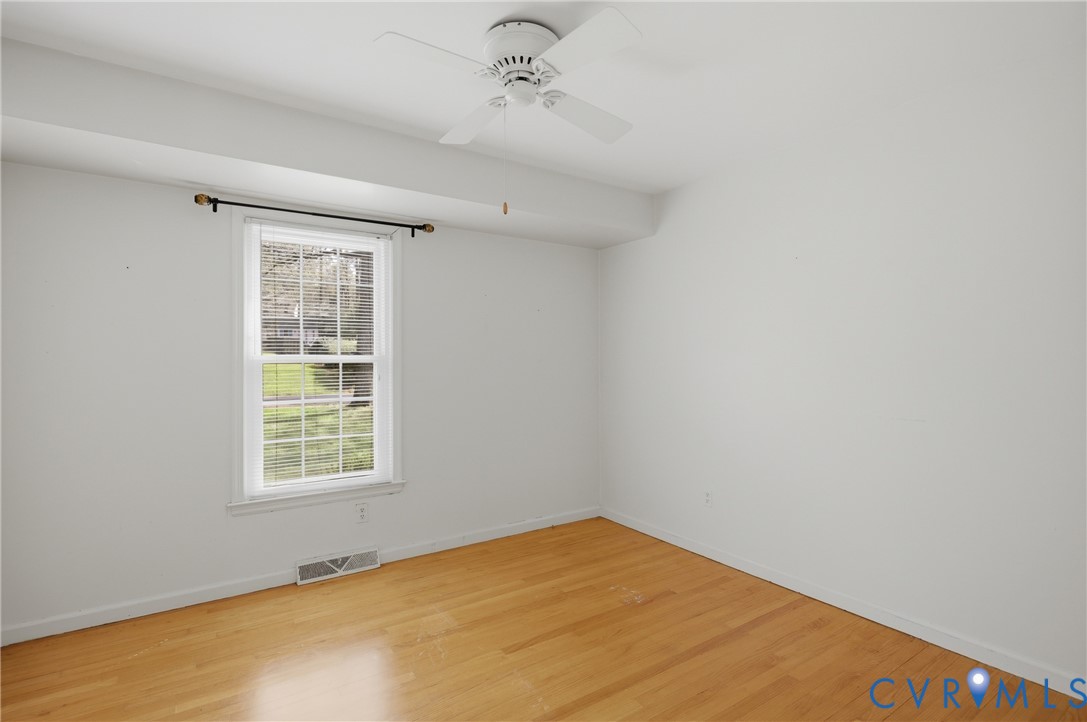 9832 Alfaree Road Richmond, VA 23237 - Photo 22 of 35 Unfurnished room featuring a ceiling fan and light