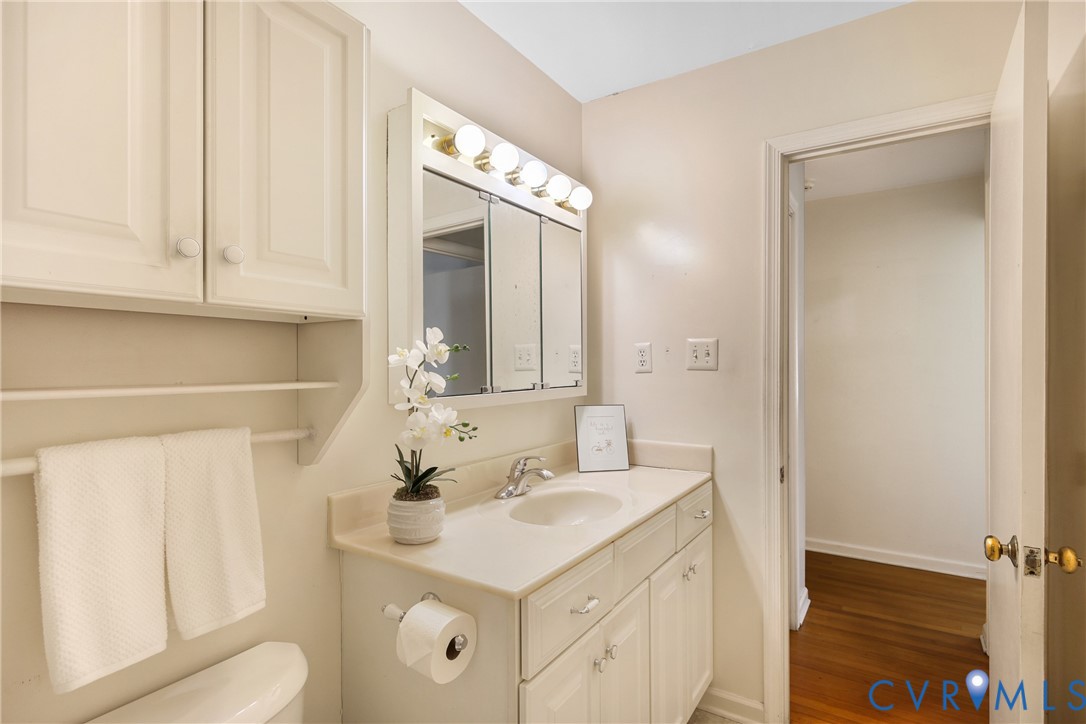 9832 Alfaree Road Richmond, VA 23237 - Photo 25 of 35 a bathroom with a sink vanity granite and a mirror