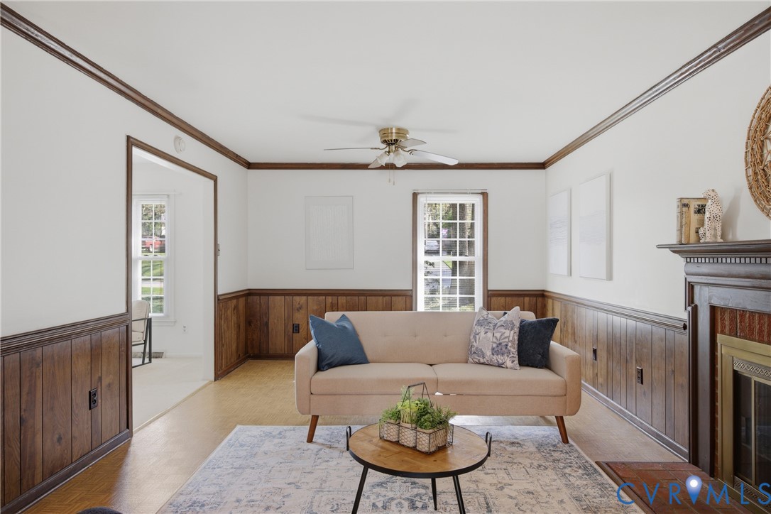 9832 Alfaree Road Richmond, VA 23237 - Photo 10 of 35 Living area with wooden walls, wainscoting, orname