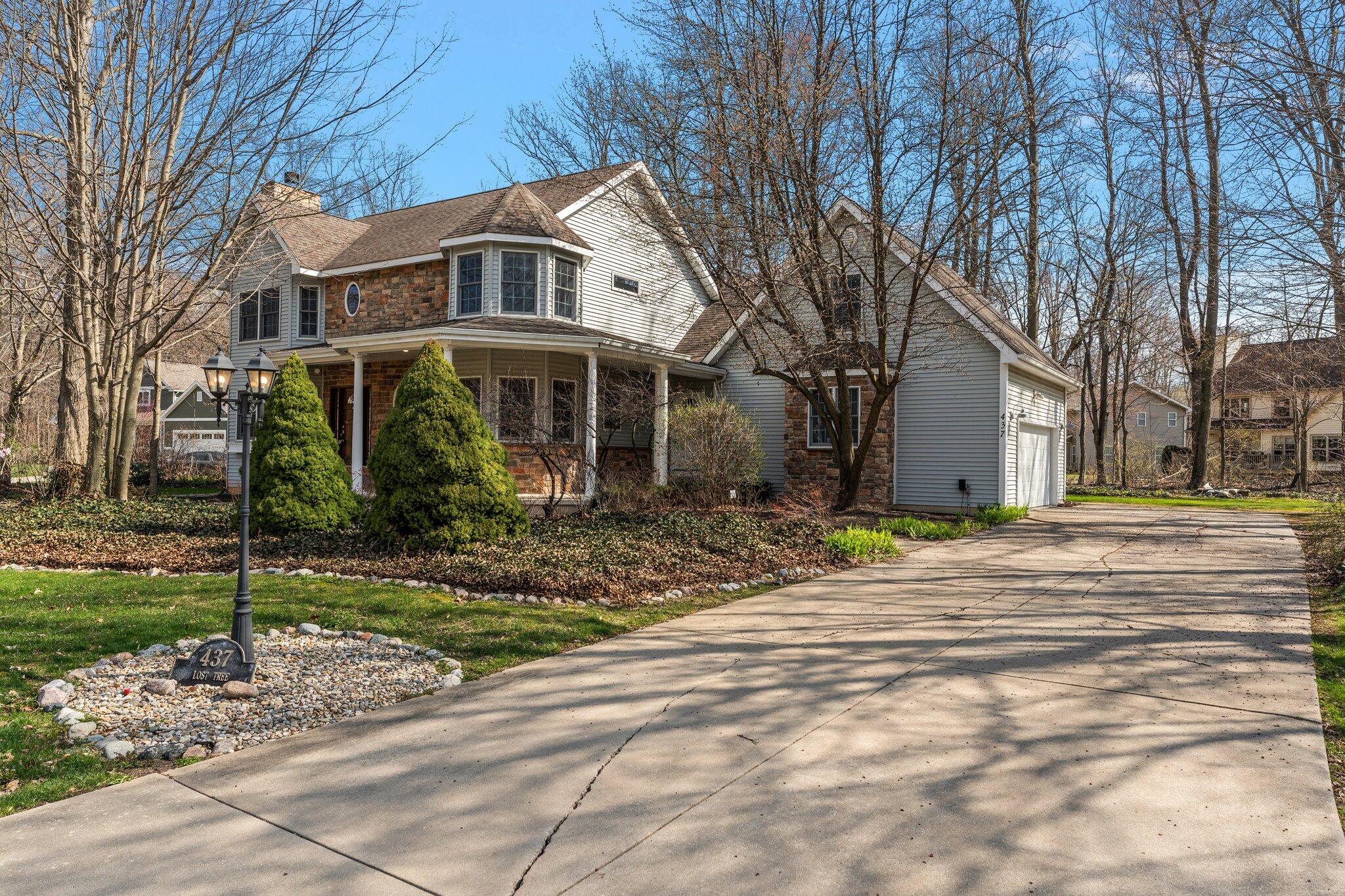 437 Lost Tree Drive Chesterton, IN 46304 - Photo 38 of 43 a front view of a house with a yard