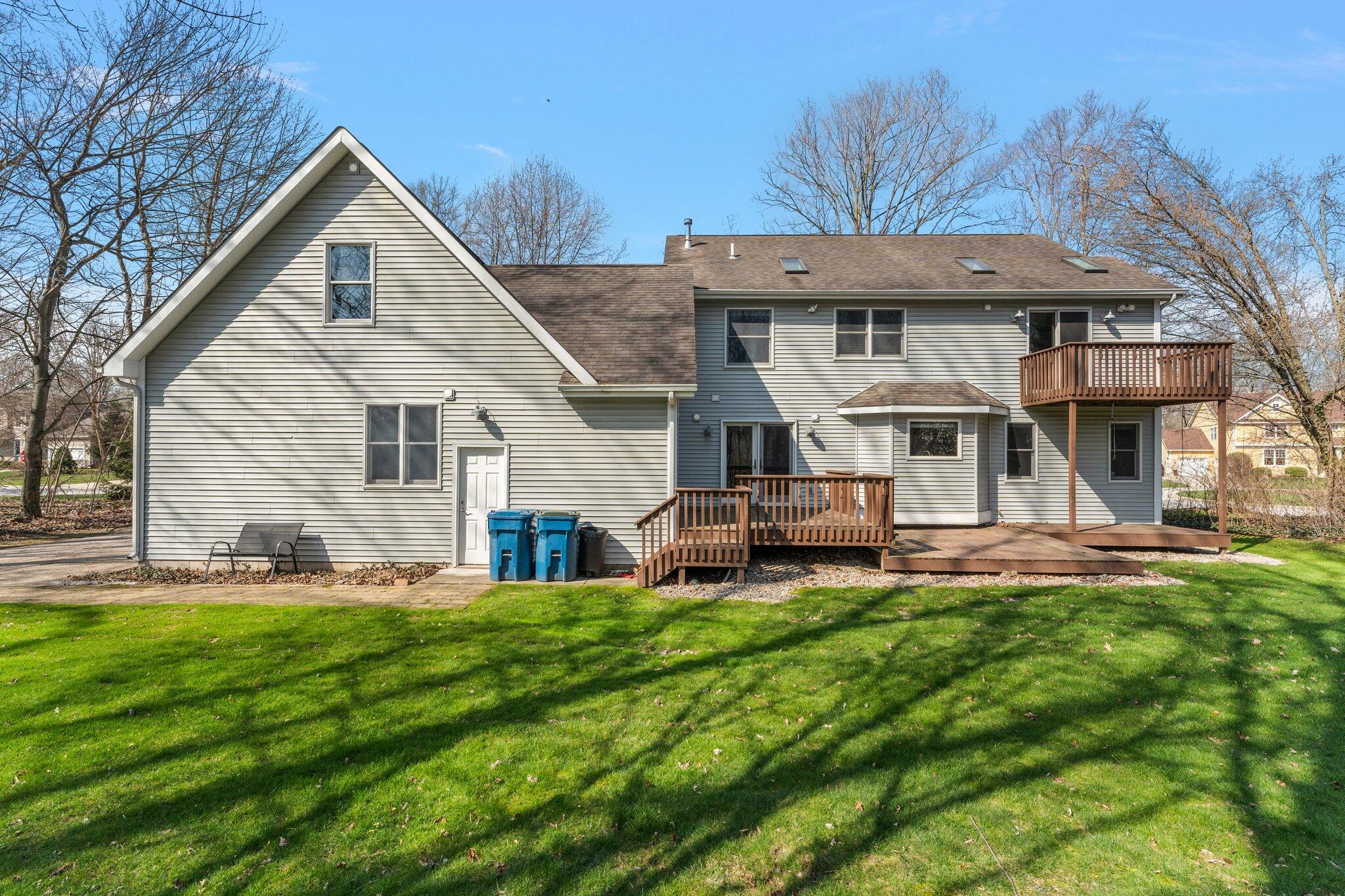 437 Lost Tree Drive Chesterton, IN 46304 - Photo 41 of 43 a front view of a house with a yard and porch