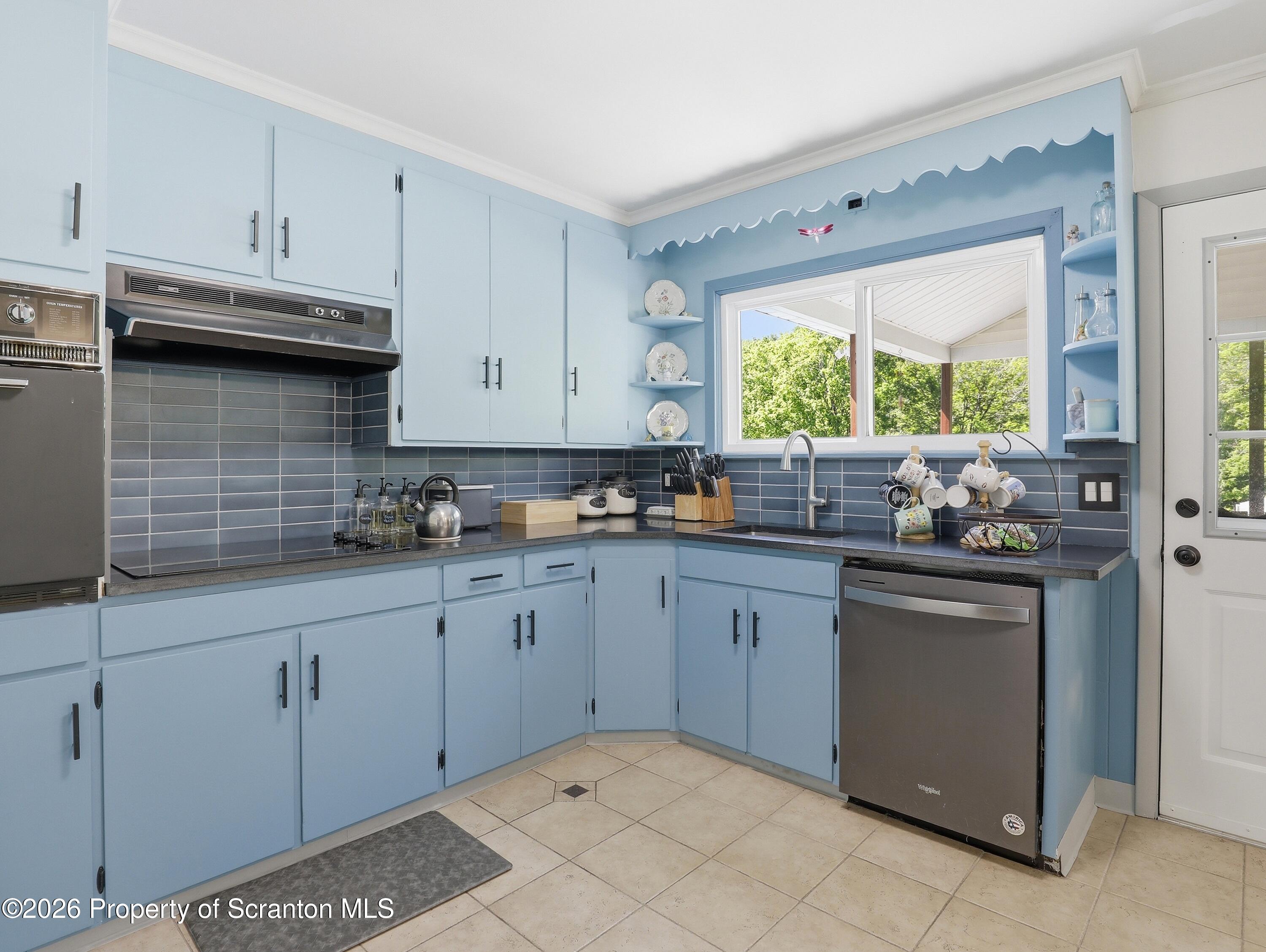 1237 Heart Lake Road Scott Township, PA 18433 - Photo 5 of 39 a kitchen with stainless steel appliances granite countertop a sink and cabinets