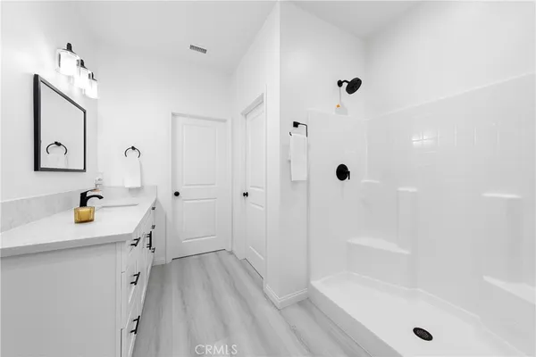 a view of an empty walk in closet