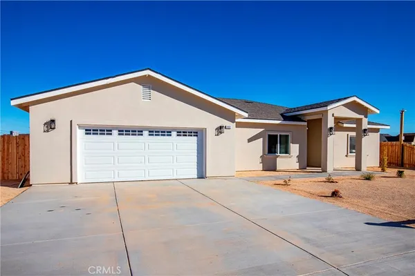 a view of a house with a patio