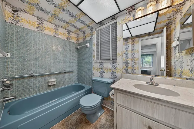 a living room with a couch and a table