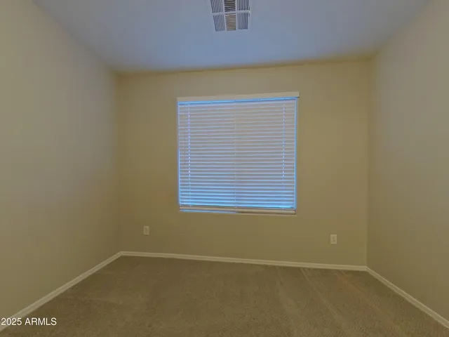 a view of a small space with a window