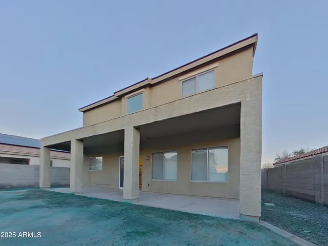 an empty room with a empty space and a window