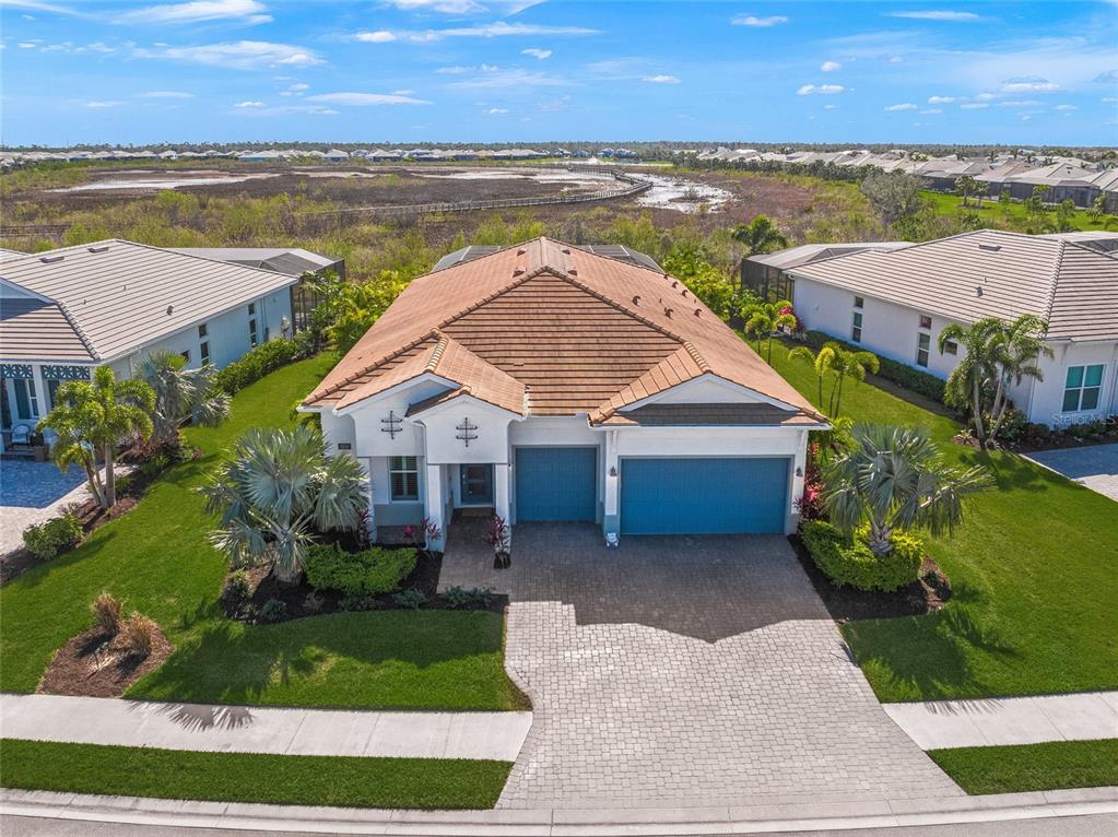 a house with river in front of it