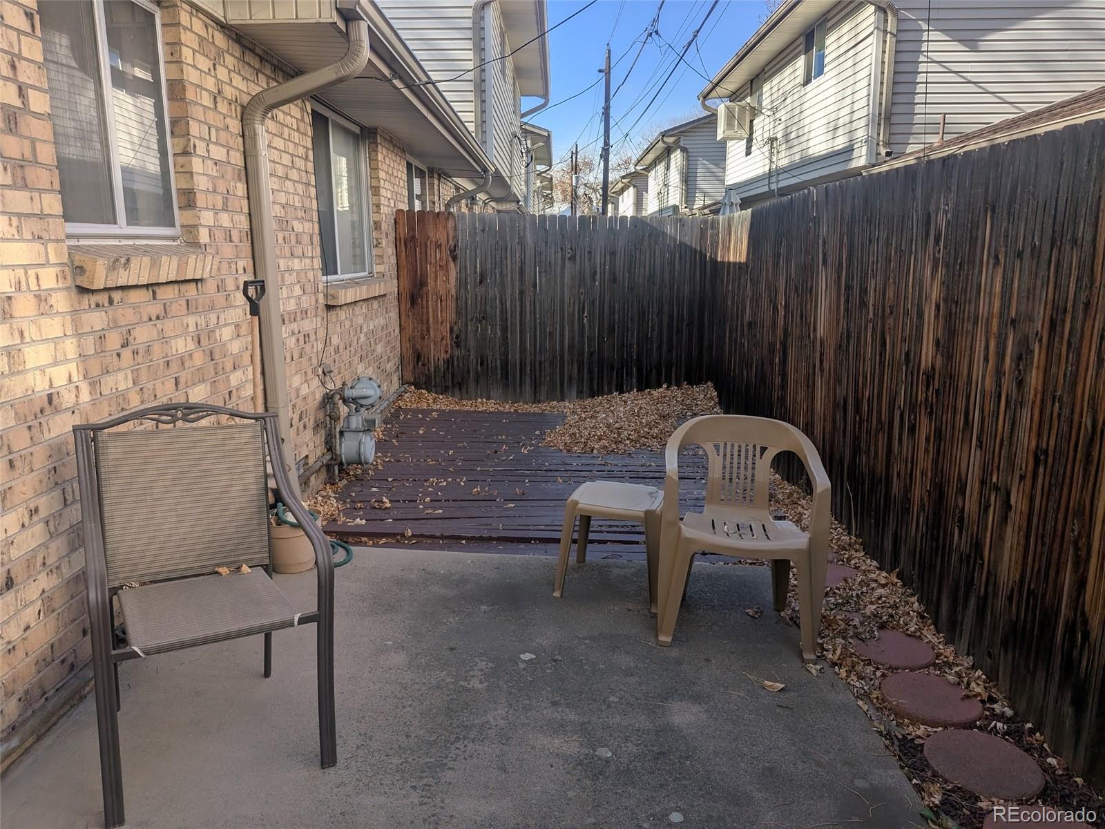4643 Independence Street, Unit 9 Wheat Ridge, CO 80033 - Photo 6 of 11 a outdoor space with a couch