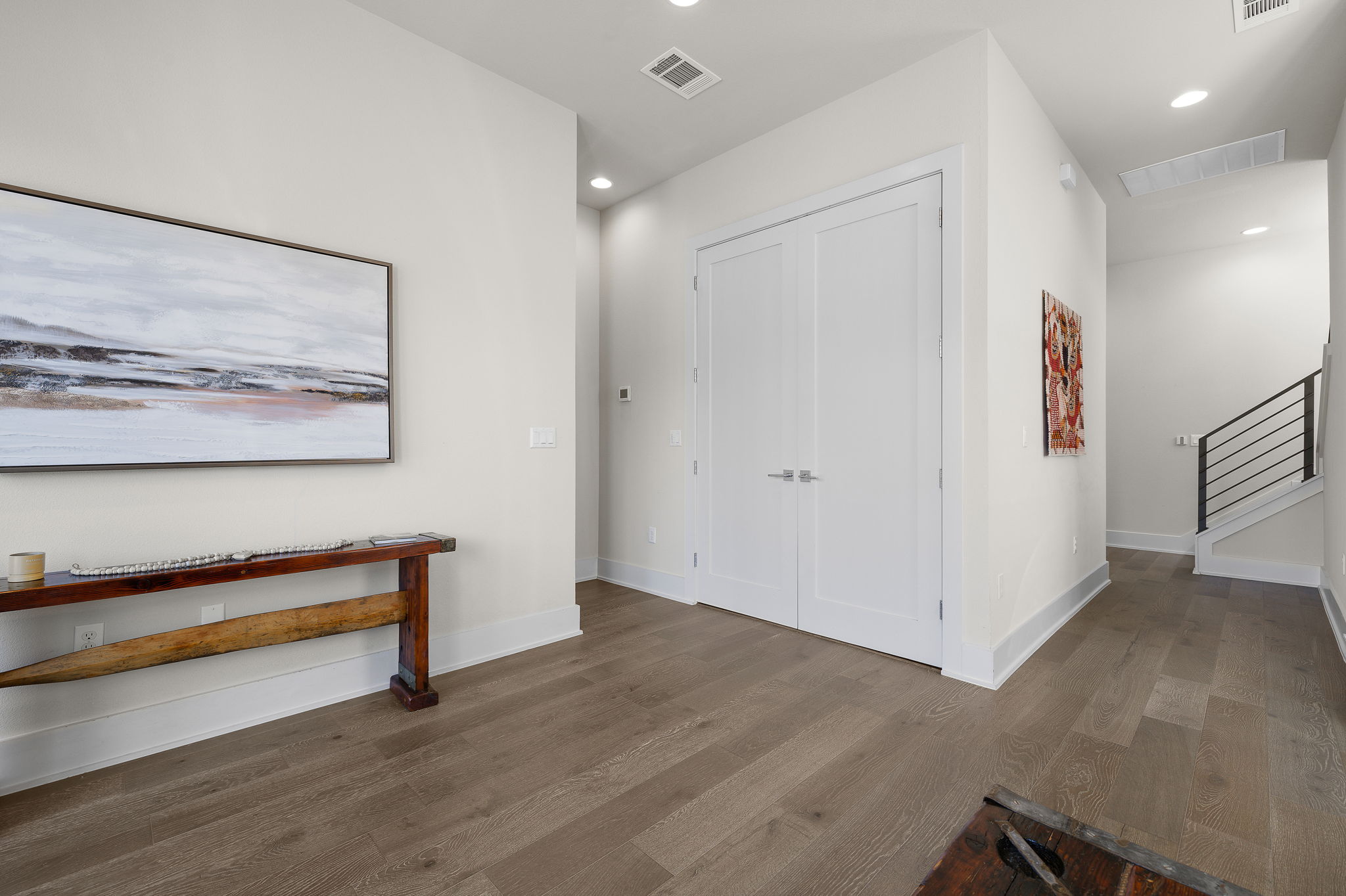 5214 Pink Poppy Pass Austin, TX 78735 - Photo 27 of 34 Corridor with recessed lighting and dark wood-type flooring