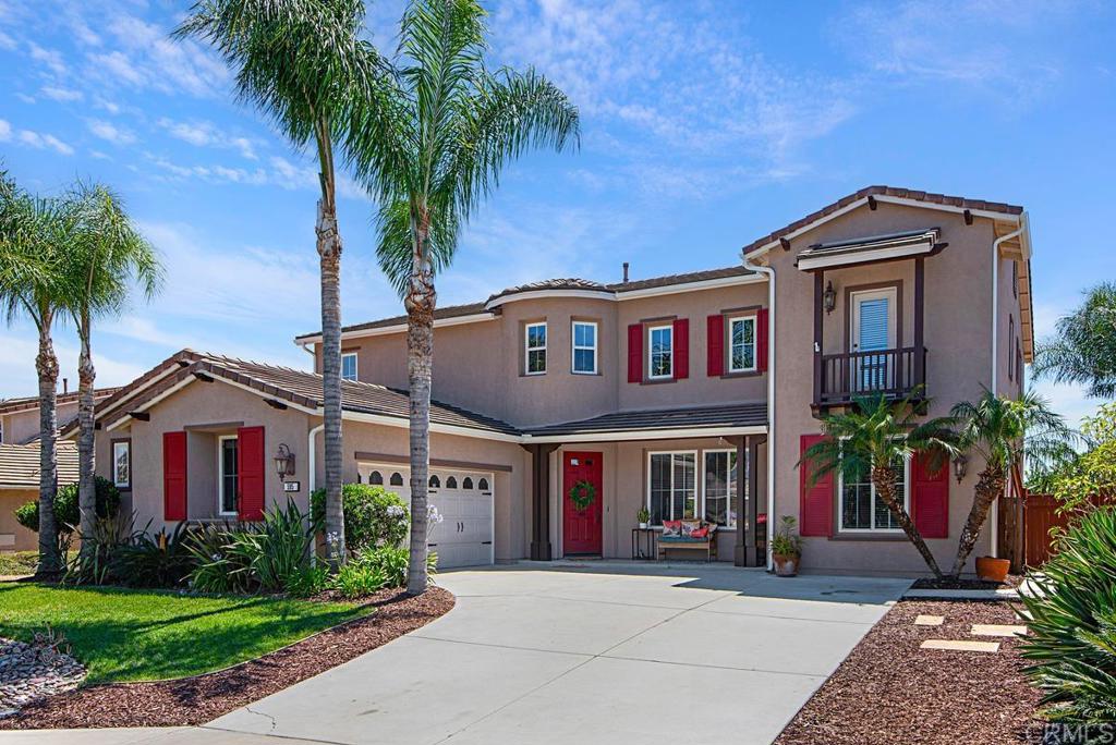 595 Hidden Trails Road Escondido, CA 92027 - Photo 1 of 1 a front view of multiple houses with yard