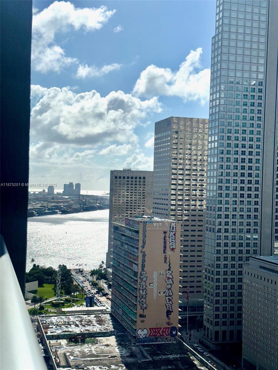 151 Southeast 1st Street, Unit 2807 Miami, FL 33131 - Photo 12 of 24 a bathroom with a toilet