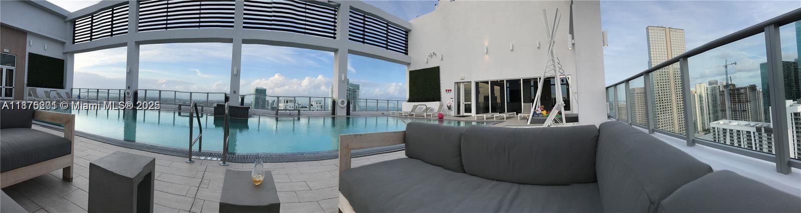 151 Southeast 1st Street, Unit 2807 Miami, FL 33131 - Photo 15 of 24 a view of entryway and hall with wooden floor