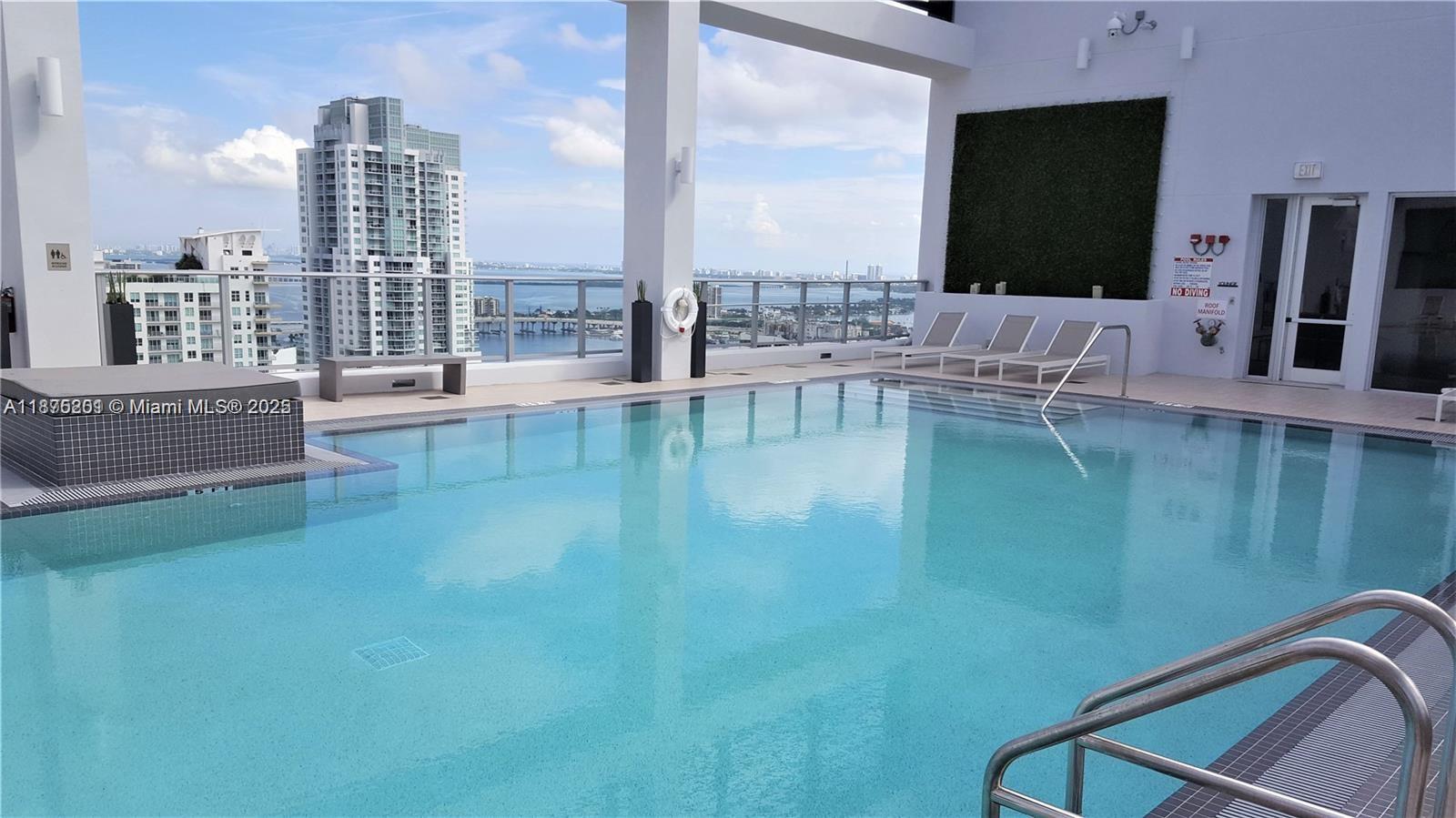 151 Southeast 1st Street, Unit 2807 Miami, FL 33131 - Photo 16 of 24 a view of balcony with couch