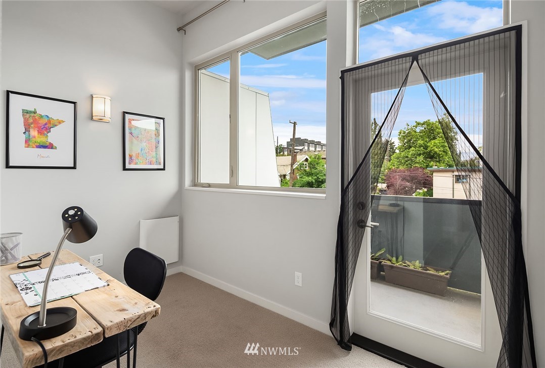 983 North 45th Street Seattle, WA 98103 - Photo 23 of 32 a view of a window in a living room