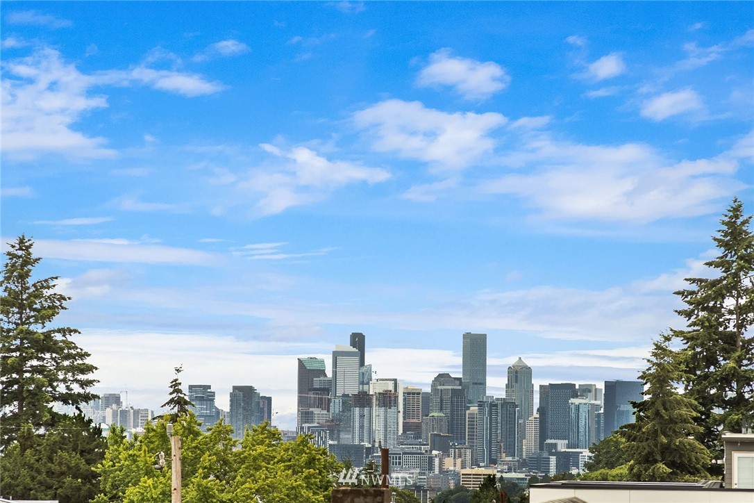 983 North 45th Street Seattle, WA 98103 - Photo 4 of 32 a view of a city with tall buildings in the background