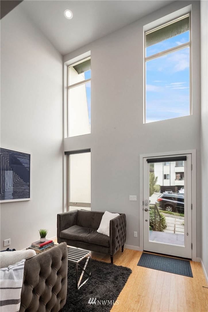 983 North 45th Street Seattle, WA 98103 - Photo 7 of 32 a living room with furniture and a window