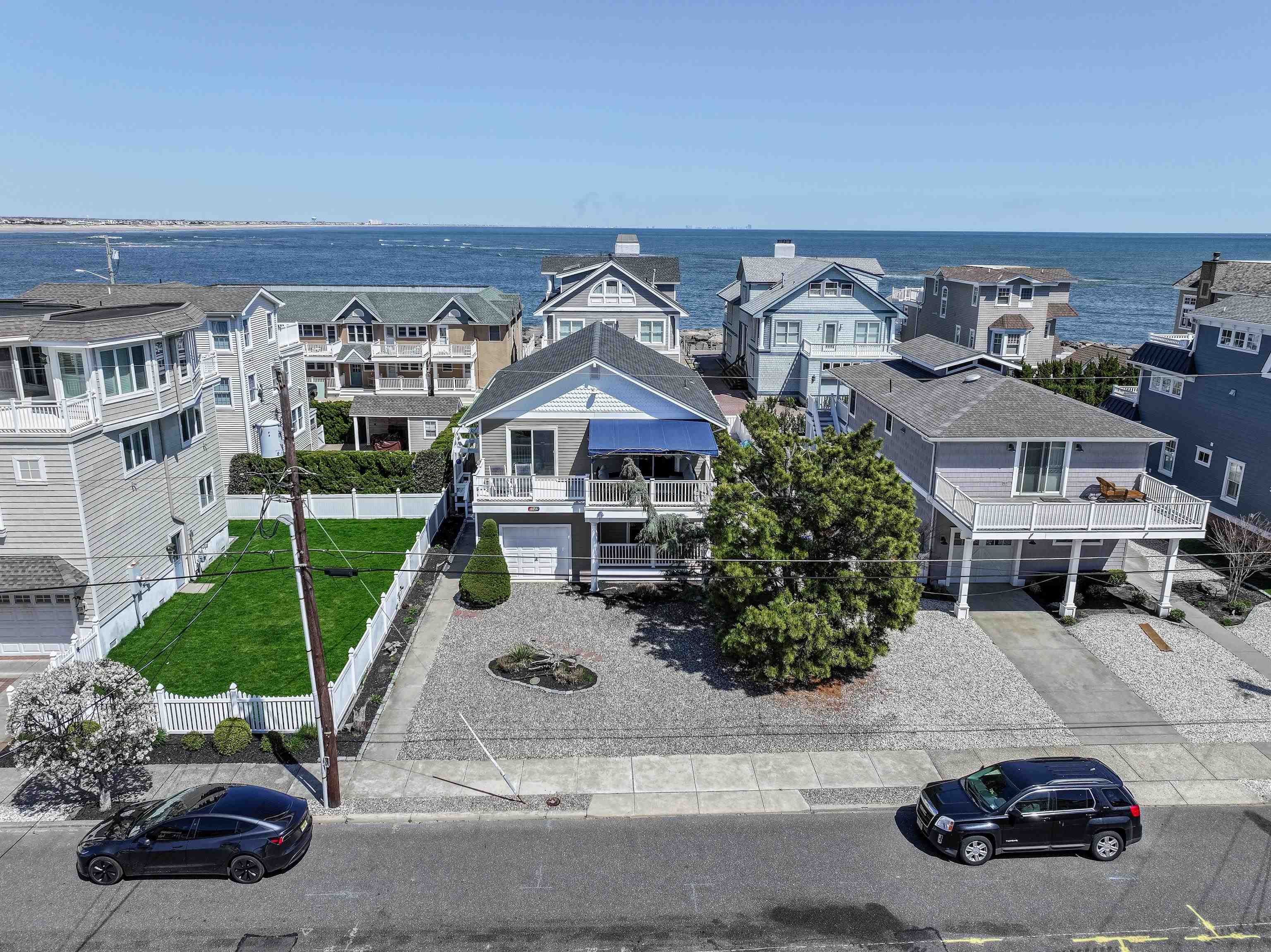 181 7th Street Avalon, NJ 08202 - Photo 1 of 29 a view of multiple houses with a street