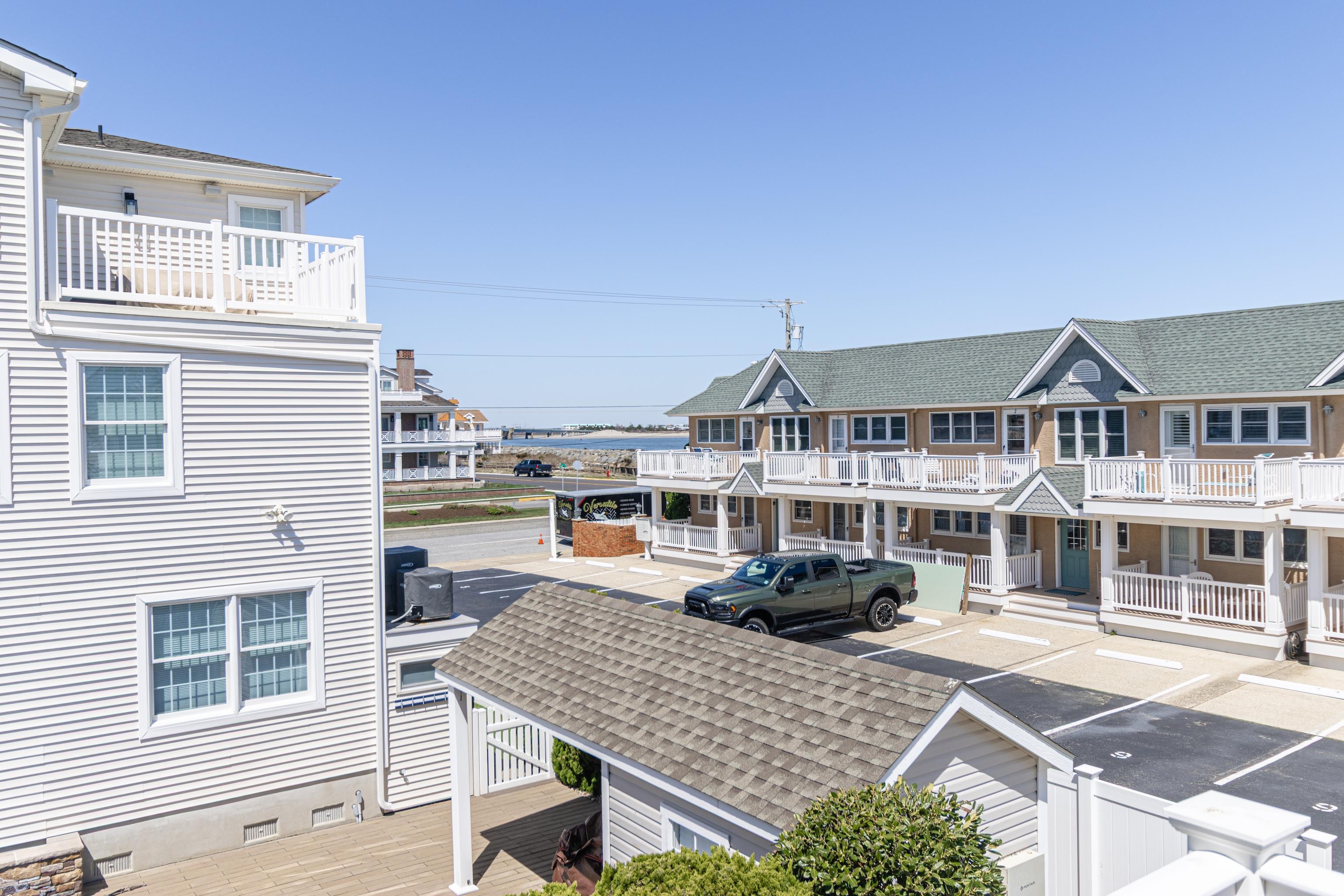 181 7th Street Avalon, NJ 08202 - Photo 18 of 29 a car parked in front of a building