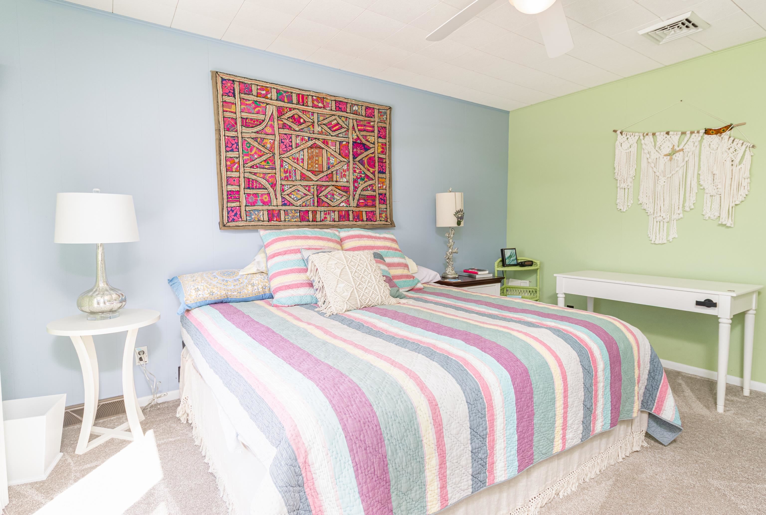 181 7th Street Avalon, NJ 08202 - Photo 23 of 29 a bedroom with a bed and a lamp