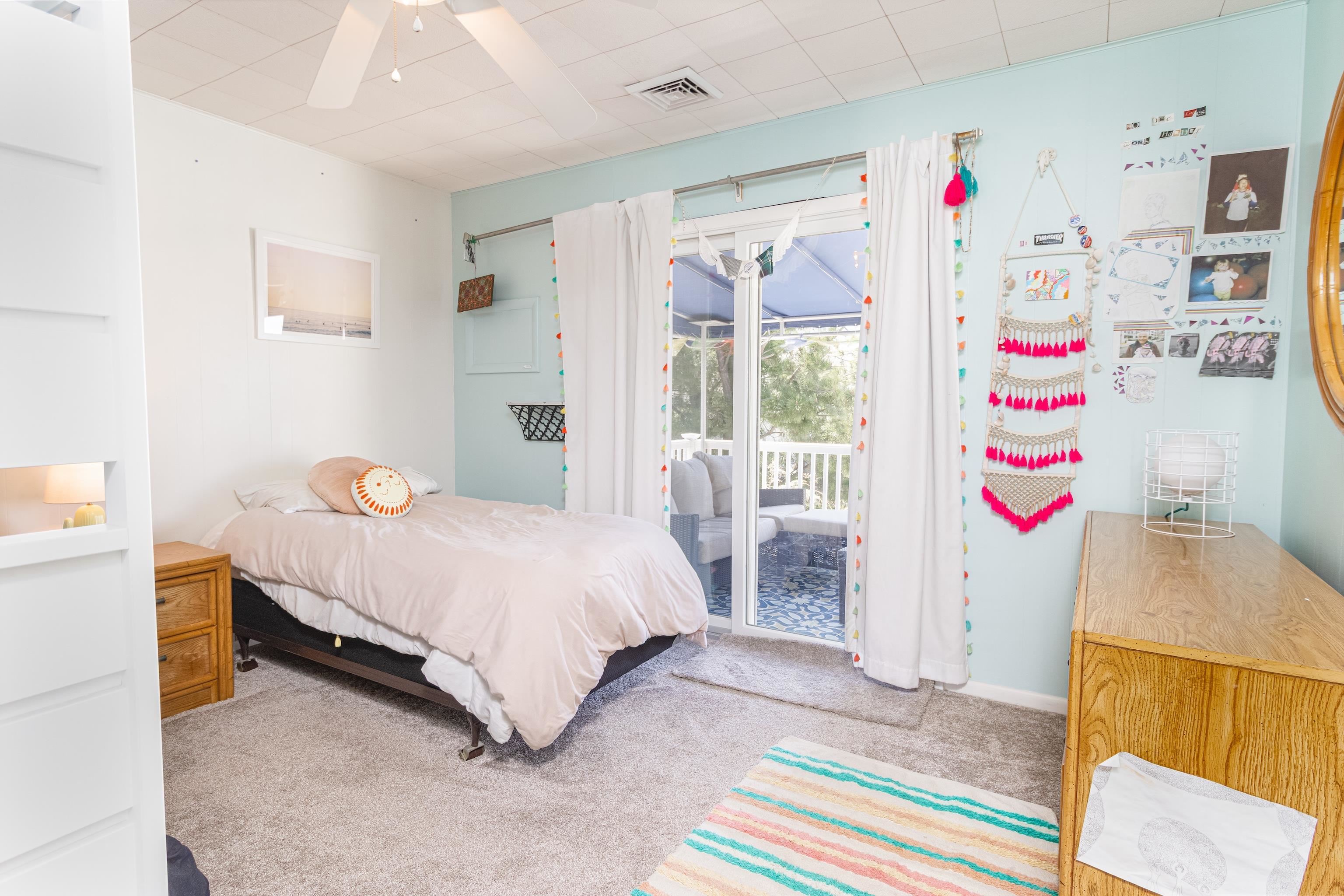 181 7th Street Avalon, NJ 08202 - Photo 24 of 29 a bedroom with a bed dresser and a window