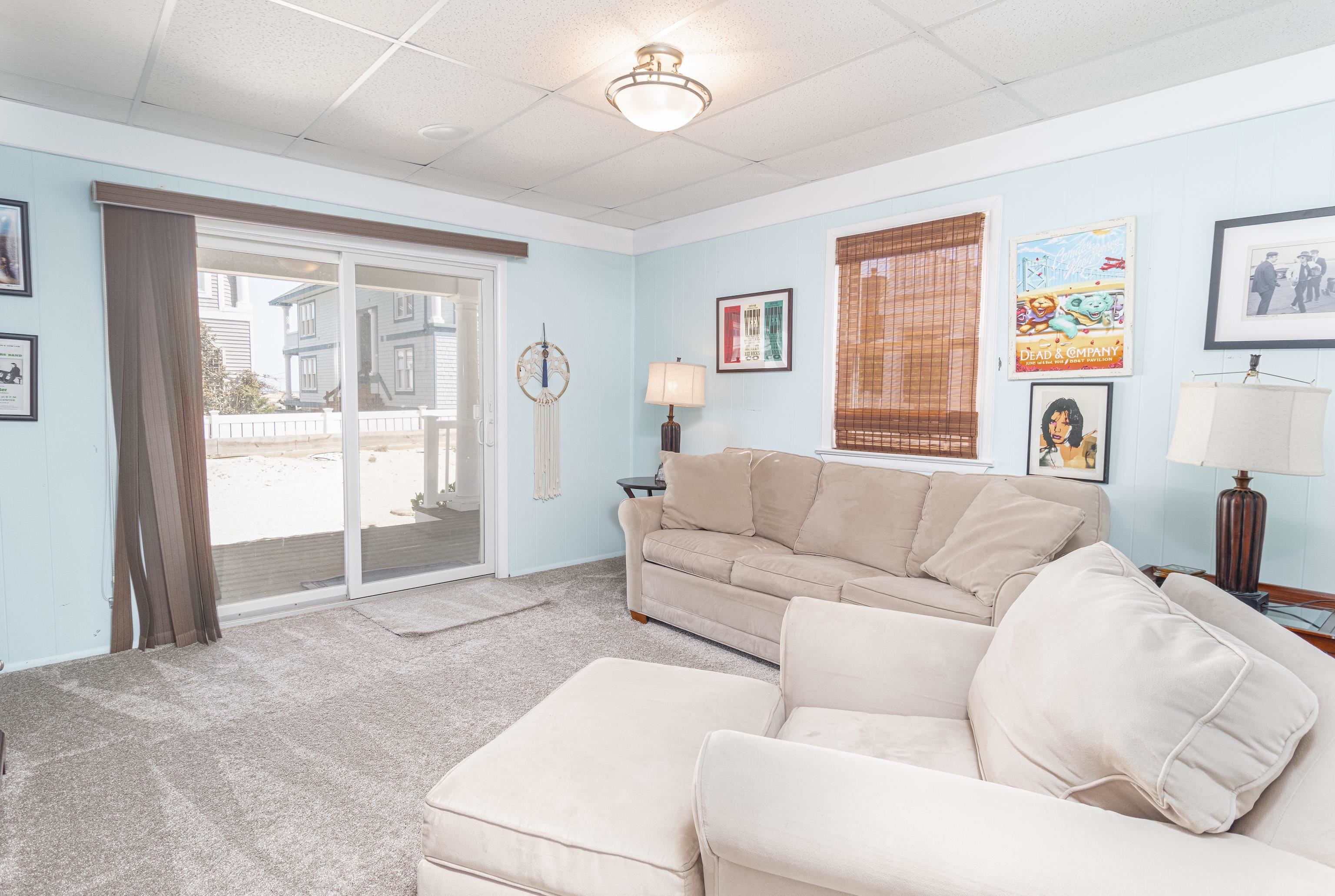 181 7th Street Avalon, NJ 08202 - Photo 6 of 29 a living room with furniture and a window