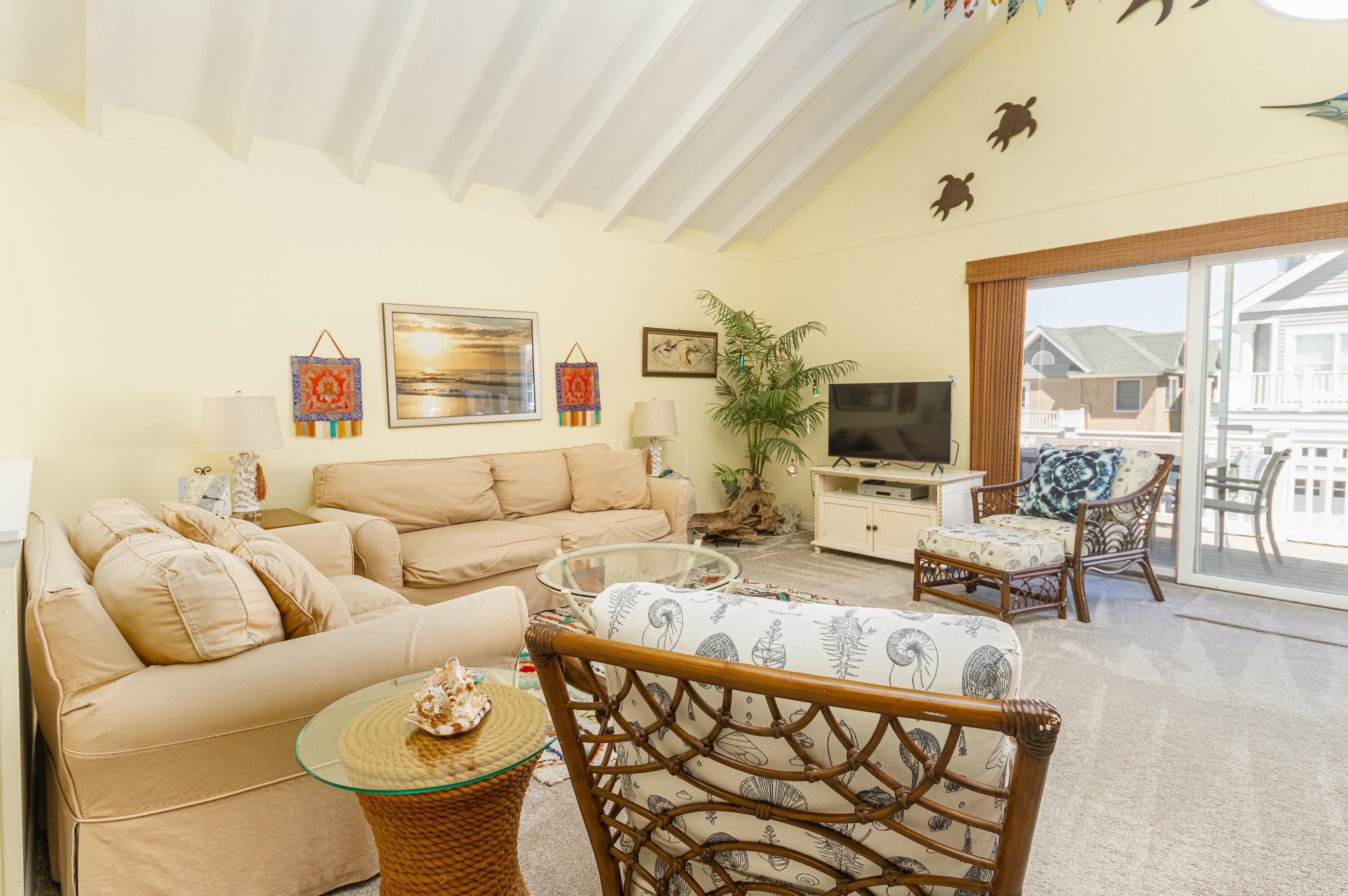 181 7th Street Avalon, NJ 08202 - Photo 10 of 29 a living room with furniture and a large window