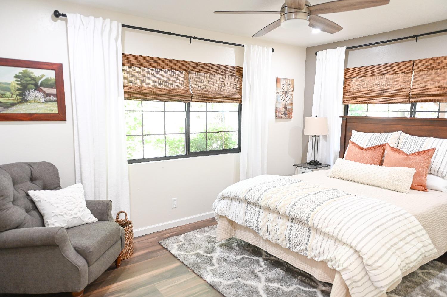 30128 Auberry Road Prather, CA 93651 - Photo 23 of 99 a bedroom with a large bed and a window
