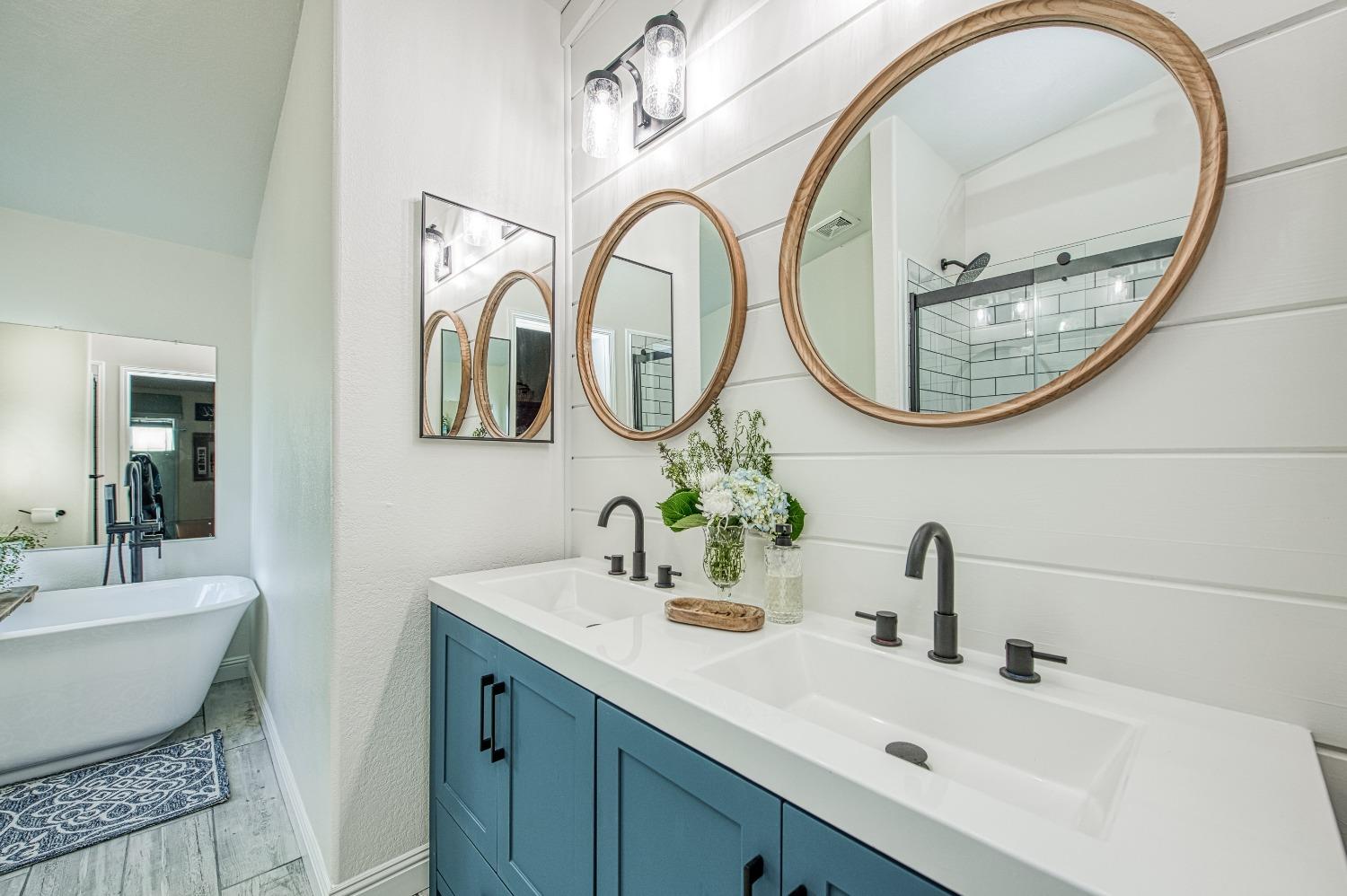 30128 Auberry Road Prather, CA 93651 - Photo 40 of 99 a bathroom with a sink and a mirror